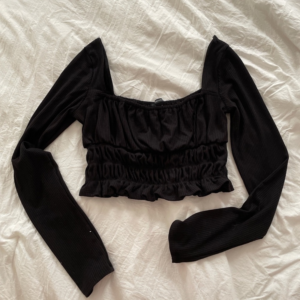 black cropped long sleeve top